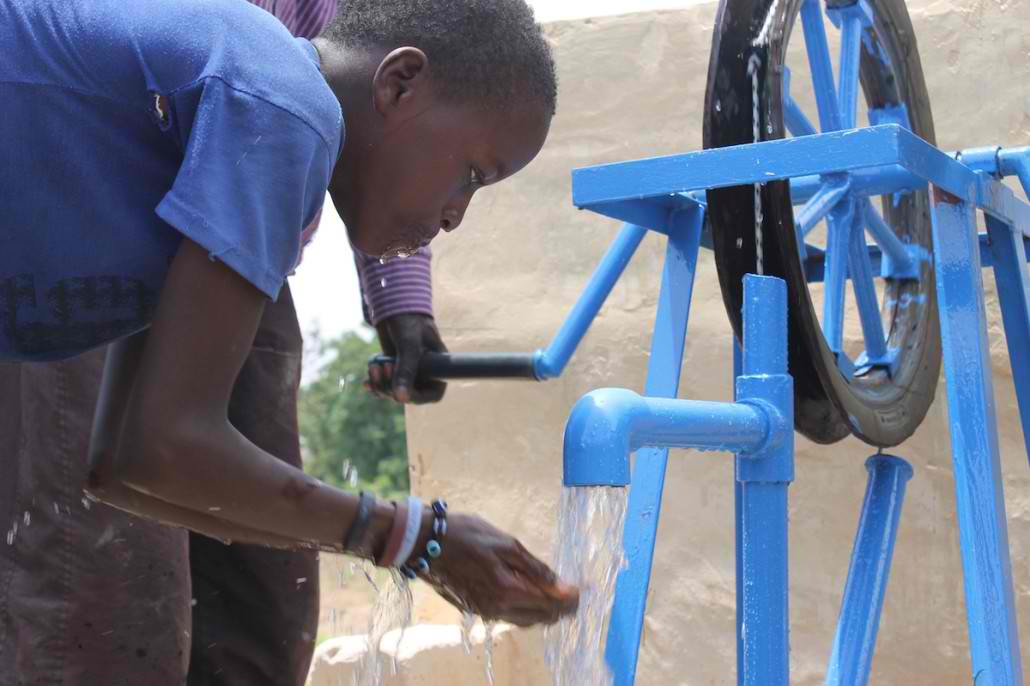 Well-drilling bring fresh water, gospel message to West African villages